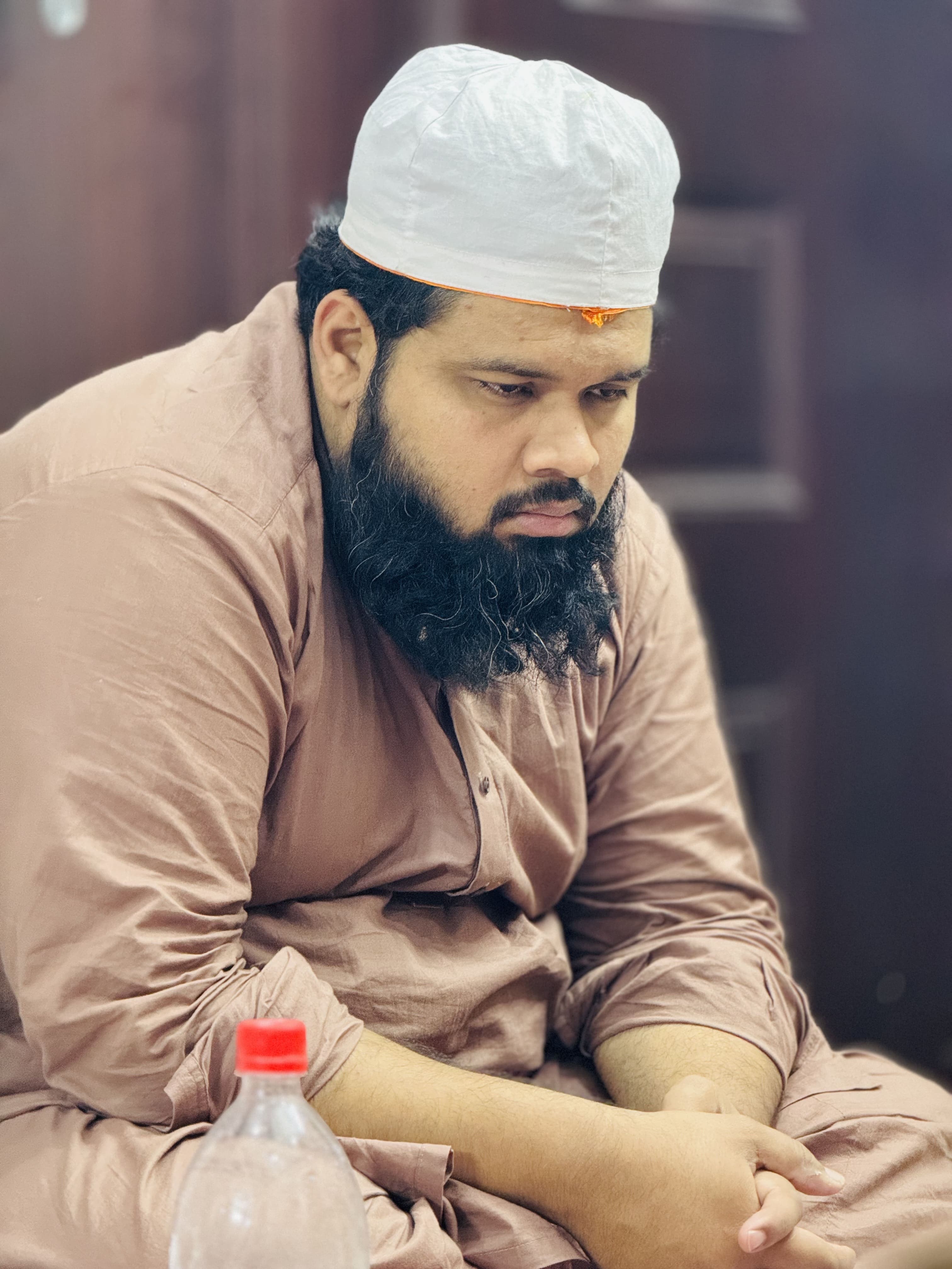 Haji Umar Iftikhar Chishti blurred